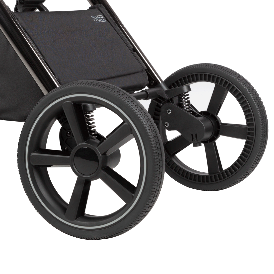 Универсальная коляска Ultimo CH 2 в 1 2025 ANIM Задняя ось колёсной базы оборудована пружинной амортизацией и надёжным спаренным тормозом.